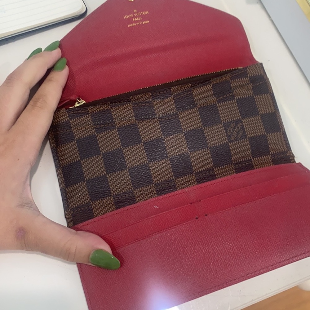 Louis Vuitton wallet.